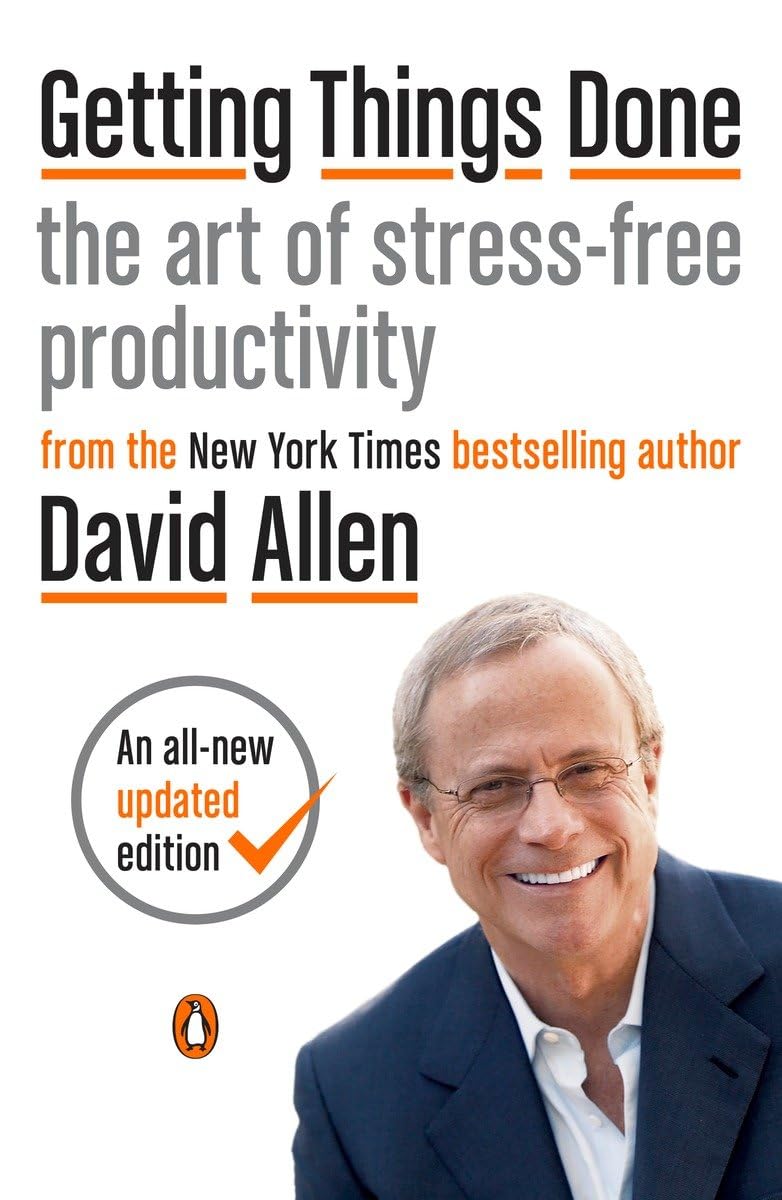 Book cover for Getting Things Done: the art of stress-free productivity by David Allen; shows a smiling man in a suit and an orange updated edition badge.