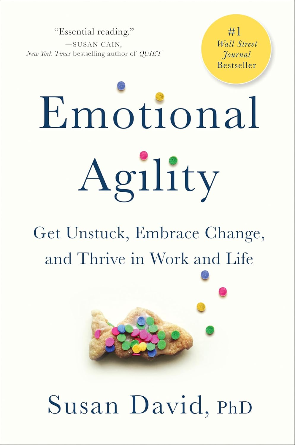 Book cover: Emotional Agility by Susan David, PhD, with scattered colorful confetti atop a cookie on a pale background.