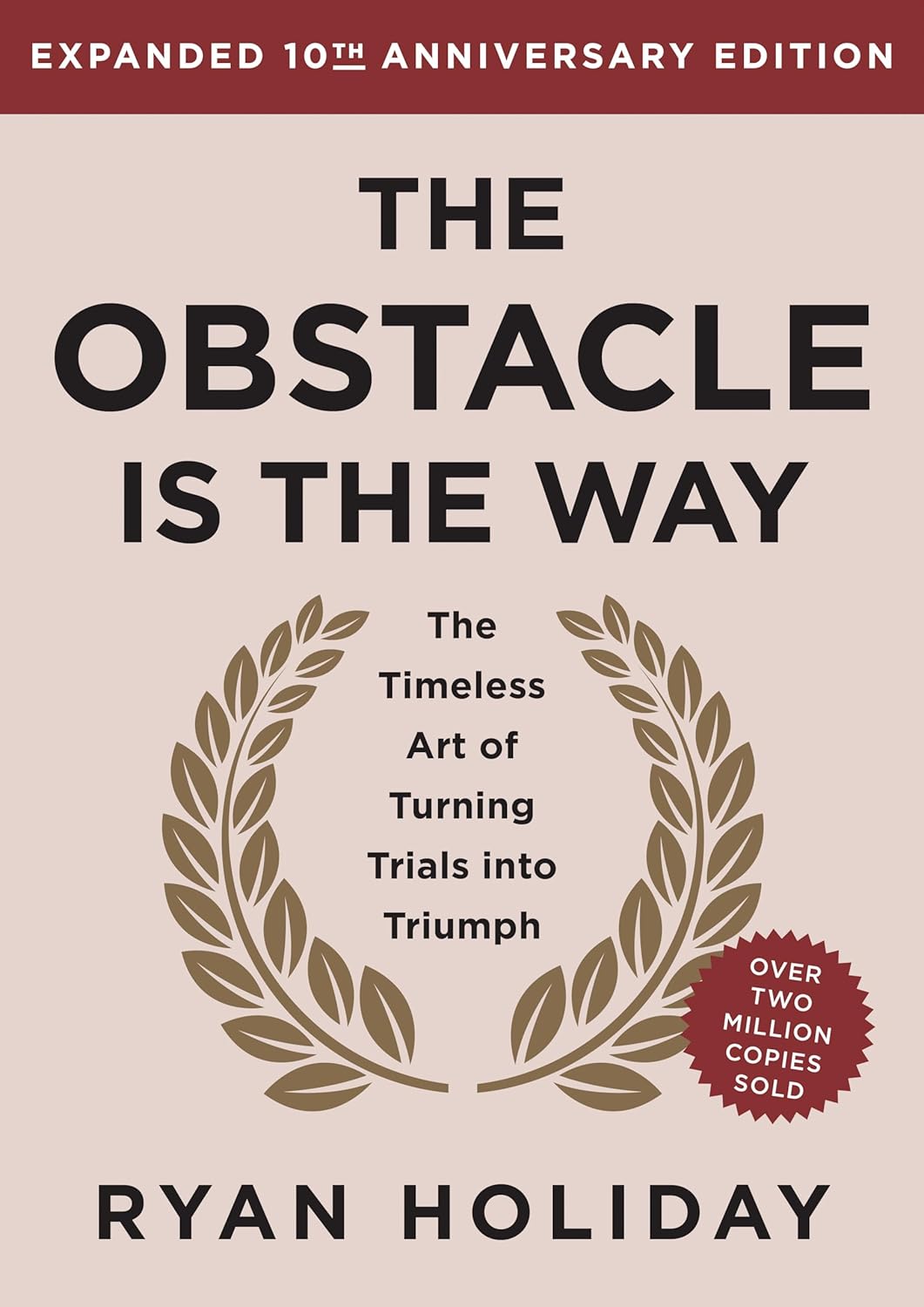 Cover of The Obstacle Is the Way by Ryan Holiday: beige background, bold black title, laurel wreath, subtitle 'The Timeless Art of Turning Trials into Triumph', and 'Expanded 10th Anniversary Edition' banner.