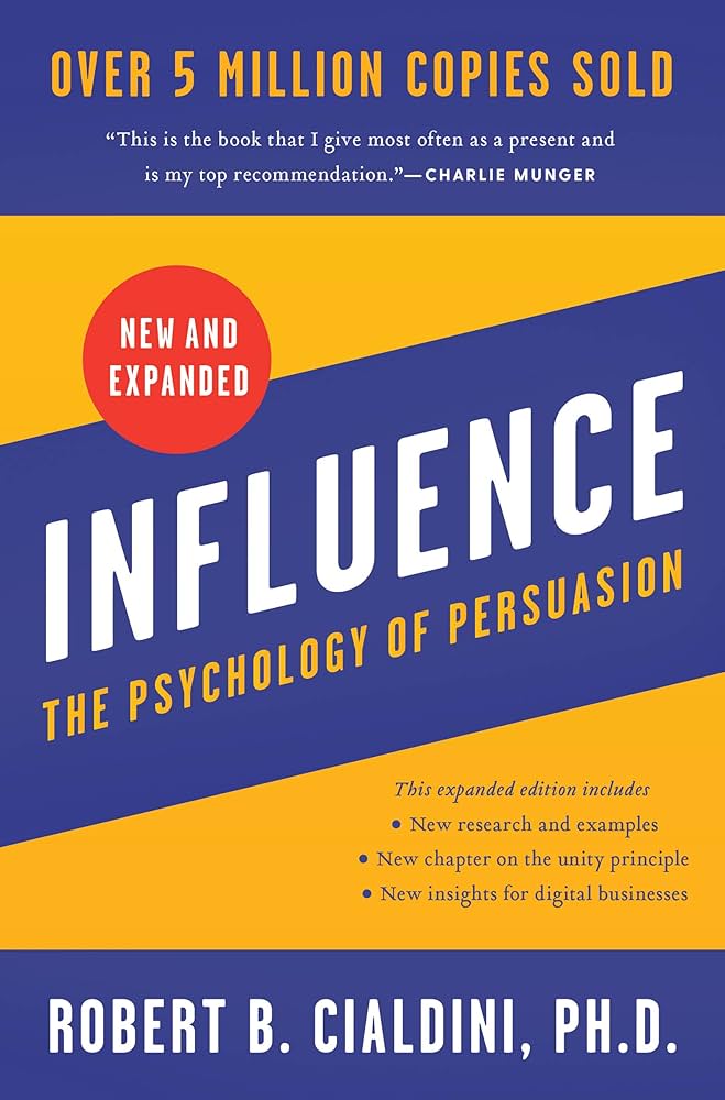 Book cover for Influence: The Psychology of Persuasion, 2nd/expanded edition by Robert B. Cialdini, blue and orange design with a red 'New and Expanded' badge.
